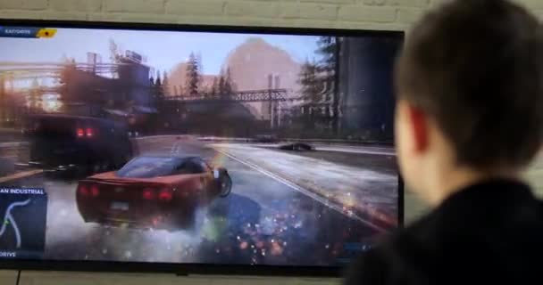 Visão Traseira Menino Jogando Carro Corrida Com Joystick Casa Gamer — Vídeo de Stock