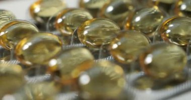 Omega 3 veya balık yağı hapları. Bagamo hapları yakın plan. İlaç sanayisi. Biyolojik takviye ve vitamin işi