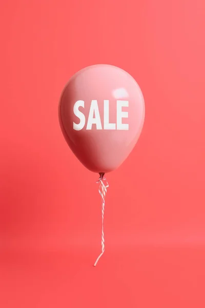 Rosafarbener Ballon Mit Verkauf Text Auf Rosa Hintergrund lizenzfreie Stockbilder