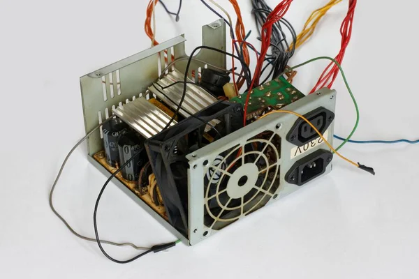 old power supply unit computer on white background