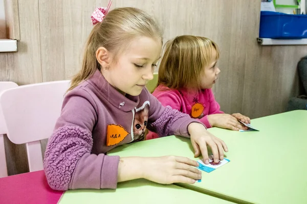 stock image Children comining from different war area in Ukraine residing at the Dnipro refugee center. Caritas Ukraine provides humanitarian aid and supports communities affected by the long-term impacts of the conflict, including emergency supplies, education 