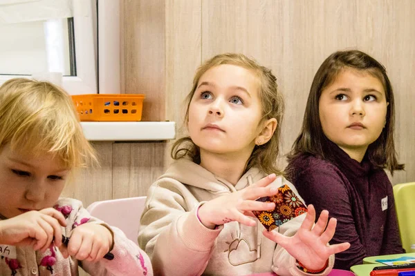 stock image Children comining from different war area in Ukraine residing at the Dnipro refugee center. Caritas Ukraine provides humanitarian aid and supports communities affected by the long-term impacts of the conflict, including emergency supplies, education 