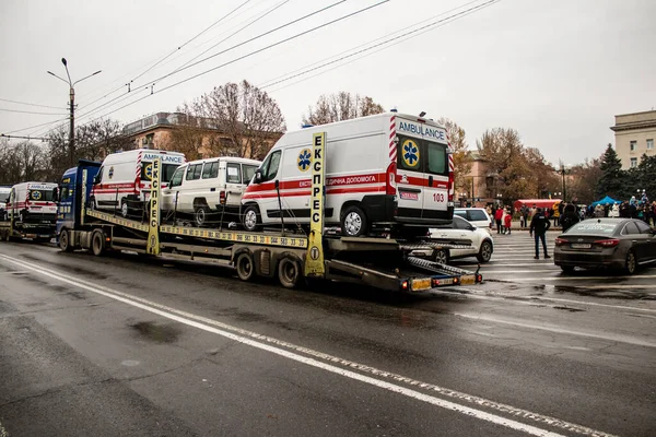 stock image The Ukrainian government delivers ambulances to the city of Kherson, the vehicles are transported by truck to the hospital where the ambulances will be put into service. Russian troops left Kherson after a nine-month occupation and a counter-offensiv
