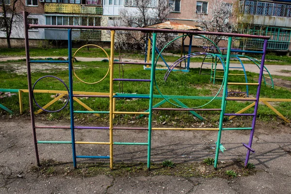 stock image Abandoned playground located in Sloviansk. The children can no longer play outside because the city is under Russian bombardment. The city has become too dangerous for civilians because it is part of the front line.