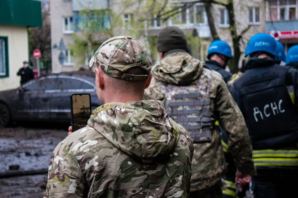 stock image Rescuers intervene on a building in a residential area of Sloviansk was hit head-on by an S300 missile. The damage is considerable and many victims are still under the rubble. Civilians are prime targets.