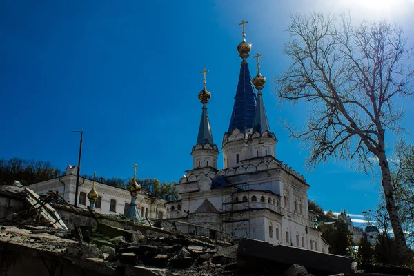 stock image The Svyatohirsk Laura Monastery was damaged by shrapnel from the explosion following intense artillery fire. The city of Sviatohirsk was a battlefield between the Russian and Ukrainian armies. Heavy fighting took place in this region.