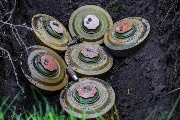 stock image Vasylenkove, Ukraine - 20 Apr 2023 Various Russian anti-tank, anti-personnel and explosive mines collected by deminers. A large number of defensive and attack explosives are used by the Russian army. Its explosives are a danger for the population