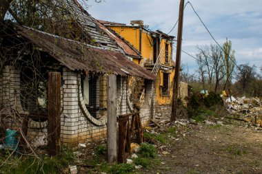 Destroyed building located at Kharkiv front line, Russian army bombs civilian targets and cause a lot of damage. Heavy fighting took place in this region. clipart