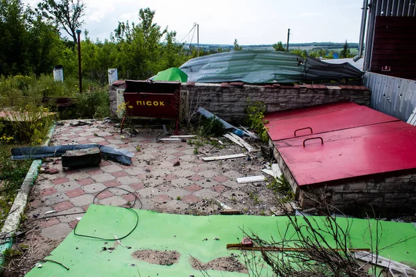 stock image The gas station near Kam'yanka village is destroyed and permanently closed, this prevents inhabitant from refueling in order to leave the combat zone. Civilian infrastructures are prime  target by the Russian army.