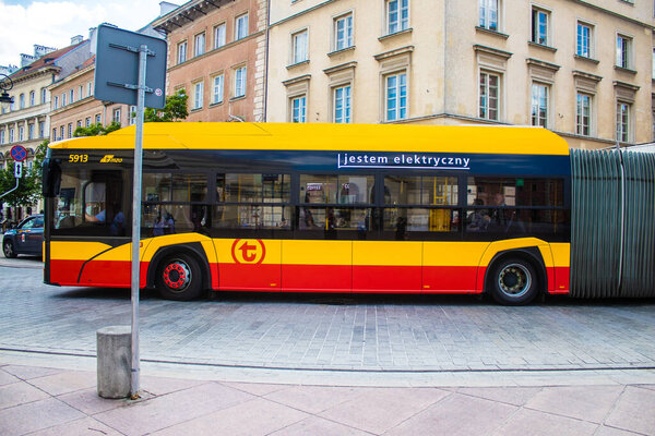 Warsaw, Poland - May 28, 2023 Bus driving in the streets of Warsaw and part of the transport system of the city, the fares are not expensive.