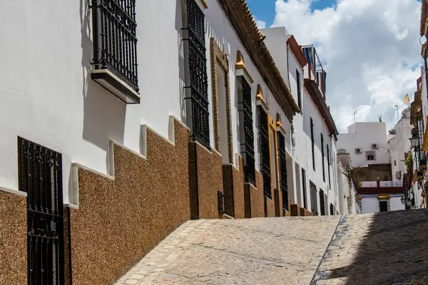 stock image Carmona, Spain - June 10, 2023 Architecture and cityscape of Carmona's town. View of the narrow white streets of one of the oldest cities in Europe and an emblematic place in Andalusia, southern Spain