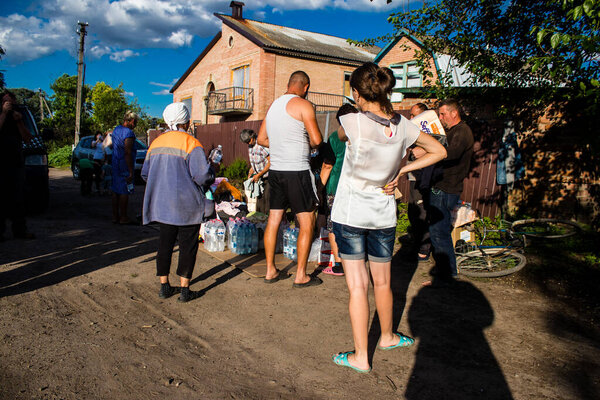 The few civilians residing in the village of Kam'yanka in Ukraine receive aid from humanitarian organizations. People live without water and electricity. The Russian army was driven out by the Ukrainians after several months of occupation.