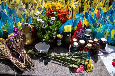 Thousands of flags have been planted at the makeshift memorial for fallen soldiers in Maidan Square in Kyiv. Each flag is a tribute to someone who was killed by Russia's war in Ukraine. The flags of different countries whose fighters are nationals ar