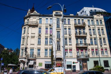 Kyiv , Ukraine - July 19, 2023 Facade of a building and architecture of the city of Kyiv, the capital of Ukraine during the war with Russia, the historical and modern buildings of Kyiv are the target of Russian missiles or drones. 