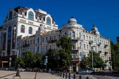 Kyiv , Ukraine - July 19, 2023 Facade of a building and architecture of the city of Kyiv, the capital of Ukraine during the war with Russia, the historical and modern buildings of Kyiv are the target of Russian missiles or drones. 