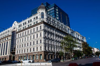 Kyiv , Ukraine - July 19, 2023 Facade of a building and architecture of the city of Kyiv, the capital of Ukraine during the war with Russia, the historical and modern buildings of Kyiv are the target of Russian missiles or drones. 