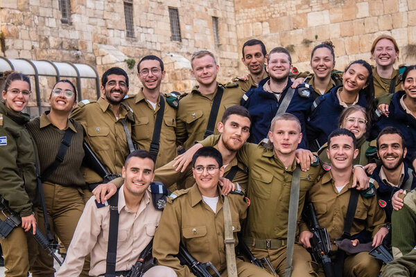 Jerusalem, Israel December 27, 2023 Induction ceremony for new graduates of the IDF Officers School. The soldiers come from different battalions and after two months of training they are appointed officers.