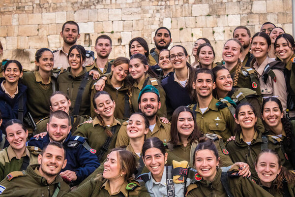 Jerusalem, Israel December 27, 2023 Induction ceremony for new graduates of the IDF Officers School. The soldiers come from different battalions and after two months of training they are appointed officers.
