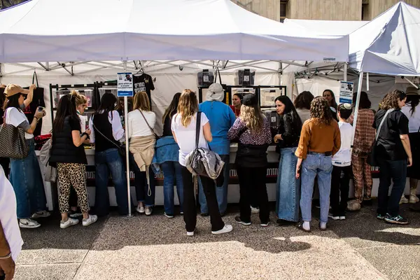 stock image Tel Aviv, Israel, March 1, 2024 Bring Them Home Now shopping stand where visitors can purchase items with proceeds going to families of hostages kidnapped by Hamas and imprisoned in Gaza Strip