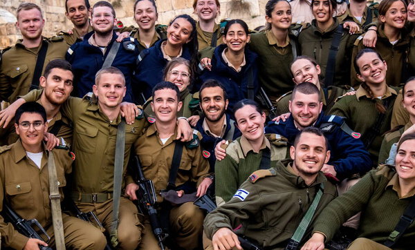 Jerusalem, Israel  December 28, 2023 Induction ceremony for new graduates of the IDF officer school. Soldiers come from various battalions and after two months of training they are appointed officers