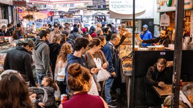 Jerusalem, Israel - December 22, 2023 People shopping at Mahane Yehuda Market, often referred to as 
