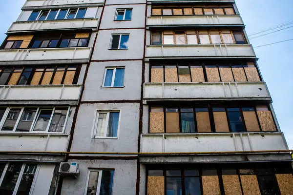 Stock image Kharkiv, Ukraine, June 19, 2024 Damaged building in Saltivka, a northern district in the metropolis of Kharkiv. The suburban area was hit harder by Russian shelling than any other area in the country.