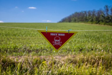 Kharkiv Oblast, Ukraine, June 25 2024 Frontline landscape in the gray zone between Ukrainian and Russian armed forces. This buffer zone is dangerous and fighting rages in the region. clipart