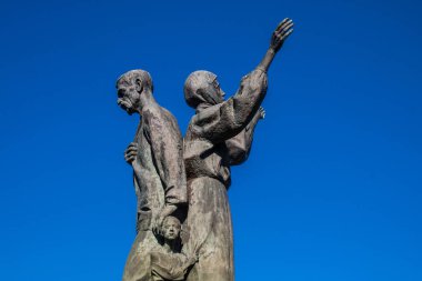 Kharkiv, Ukraine, June 25 2024 Holodomor Monument depicts a peasant family, a man, a woman and two children symbolizing suffering and hope. Since the start of the war the monument has been abandoned. clipart