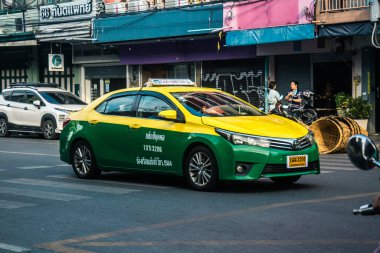 Bangkok, Tayland, 19 Ocak 2025 Taxi Tayland 'ın başkenti Bangkok sokaklarında akın ediyor. Canlı sokak hayatı, zengin kültür mirası ve hareketli pazarlarıyla ünlüdür..