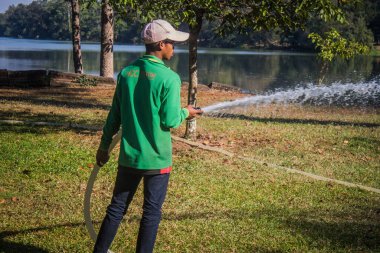 Siem hasadı, Kamboçya, 21 Ocak 2025 Angkor Wat kompleksindeki Hindu-Budist işçiler, antik Khmer başkenti Angkor 'da kurulmuştur..