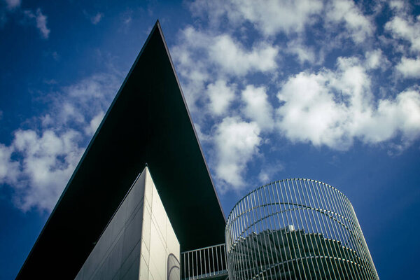 Reims, France, May 02, 2025 Cityscape and modern architecture of buildings in the city of Reims. Modernism in architecture is characterized by its emphasis on form over ornament.