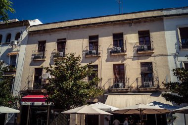 Cordoba, Spain, October 2, 2025 Streets and cityscape of the historic district in downtown Cordoba. It was founded in 1613 by the Jesuit Order. Because of this, Cordoba earned the nickname La Docta.