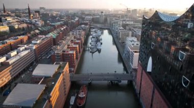 Limanın, Elbphilharmonie 'nin, Hafencity' nin ve Hamburg, Almanya, Avrupa 'nın şehir merkezinin hava görüntüleri..