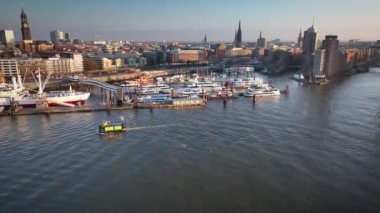 Aerial footage of Harbor city, Landungsbruecken, Elbe river in Hamburg. Shipping on the Elbe in Hamburg. 