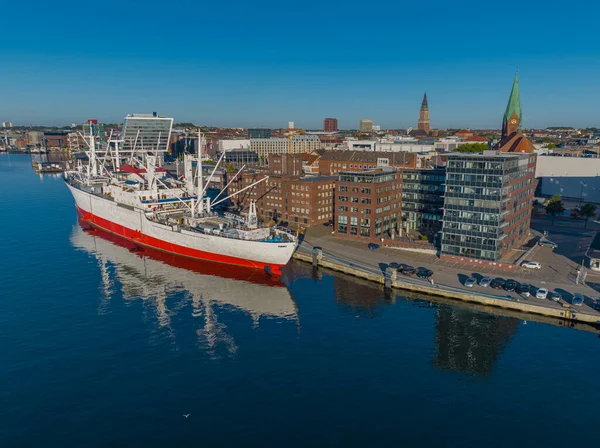  Aerial view of world's largest museum freight ship moored in Kiel harbour. 