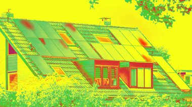 Thermographic inspection of photovoltaic systems on a roof by the house. Thermovision image of solar panels. Infrared thermovision image. Infrared thermography in inspection of photovoltaic panels. clipart