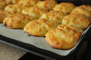 Cheese cookies on a tray. High quality photo clipart