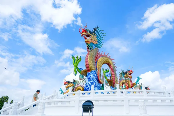 stock image Golden dancing dragon at Suan Sawan, Sawan Park or Paradise Park in Nakhon Sawan Province, Thailand.