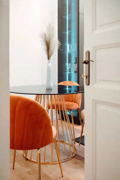 Details of dining chairs in modern loft apartment