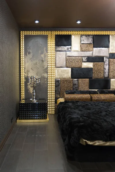 stock image luxurious romantic room in a pompous style in black and gold colors with magnificent furniture