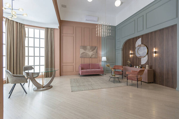 шикарный современный модный дизайн интерьера квартиры. модные зеленые и пушистые розовые стены. стильное освещение и огромные панорамные окна