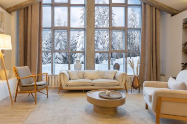 cozy warm home interior of a chic country chalet with a huge panoramic window overlooking the winter forest. open plan, wood decoration, warm colors and a family hearth clipart