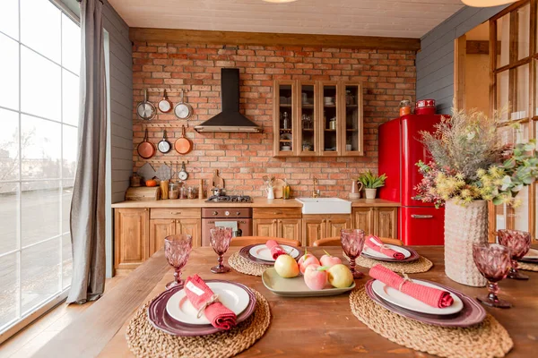 stock image cozy all wooden interior of a country house in a wooden design. spacious living room with kitchen area with large windows. bedroom on the second floor.