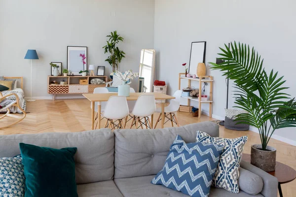 stock image The interior design of the studio apartment in Scandinavian style. A spacious huge room in light colors. stylish expensive luxury furniture.