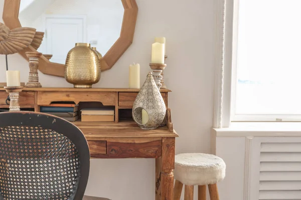 stock image modern interior of a bright room in a two-storey apartment with decorative items in bali style with a balcony. white walls, wood floors and vintage furniture