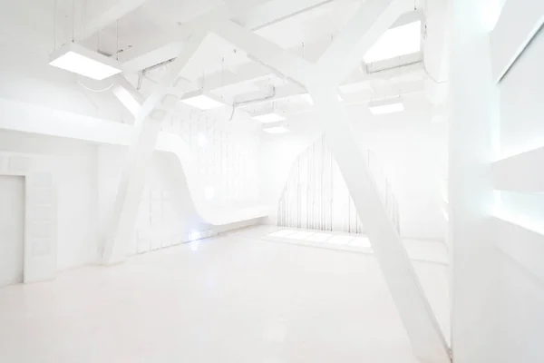 stock image Abstract futuristic empty room interior in white with illumination in the style of a spaceship. geometric decoration on the walls.