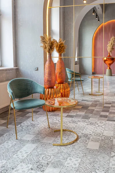 stock image interior of a large apartment in oriental mixed with loft style with arches, led lighting and bright orange elements