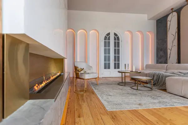 cozy interior of a modern living room with a fireplace, decorative panels and LED lighting with soft daylight, without people, in pastel colors.