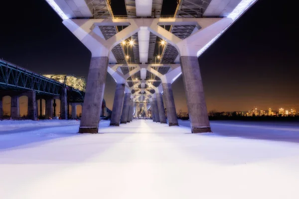 New Champlain Bridge Samuel de Champlain next to the Old Champlain Bridge in Montreal, Quebec, Canada on Saint Lawrence River.
