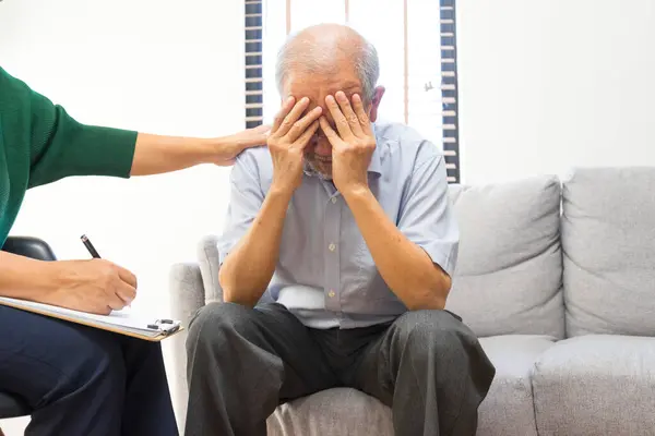 Depressed Asian Senior Man Sharing Problems Therapy Session Female Psychiatrist Royalty Free Stock Images